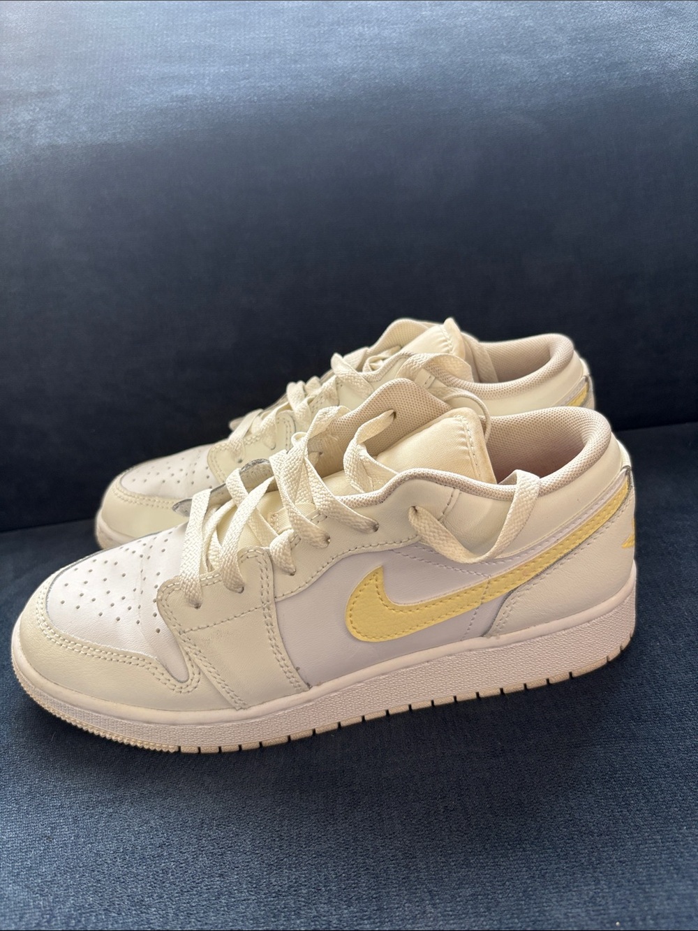 Nike Low Top Sneakers in Cream with Pale Yellow Swoosh